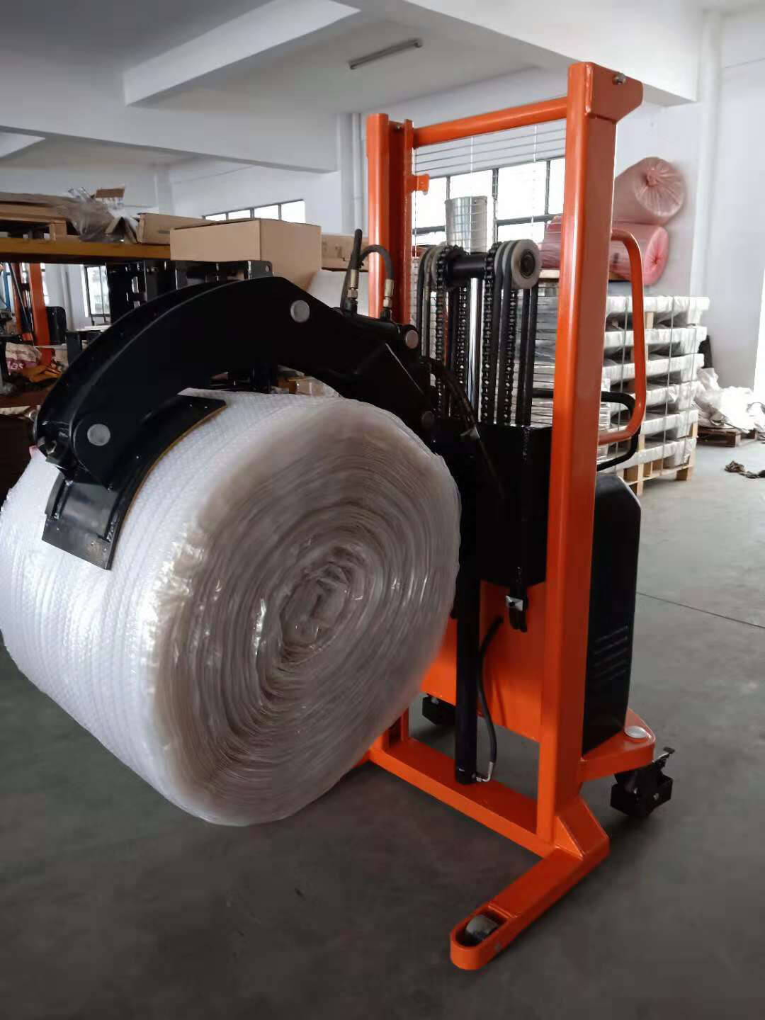 RAMHOIST Coil lifting machine with single or multi arm for carrying coil (Aluminium rolls and Copper rolls)from one place and to put down to another place-2.jpg